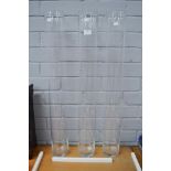 Three tall slender glass vases, each approx 79cm (3)