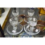 Four squat glass Holmegaard candlesticks, each approx 8cm H (4)