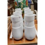 Eight Keno milk jugs, each approx 21cm H (8)