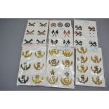 A fine group of Australian military badges. Approximately 28 items.