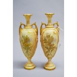 Pair of antique Royal Worcester blush ivory urn form vases, pink & green mark to base (2)