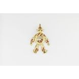 Articulating clown pendant, in 18ct yellow gold encrusted with rubies and diamonds and with a