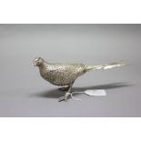 Sterling silver figure of a Pheasant marked JHO, London, 1987 approx 21cm L, 290g.