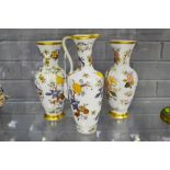 Two KPM vases and jug decorated along with flowers & birds, approx 26cm H and smaller (3)