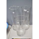 Three glass vases, approx 40cm H & shorter (3)