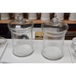 Pair of large glass lidded candy jars, each approx 40cm H (2)