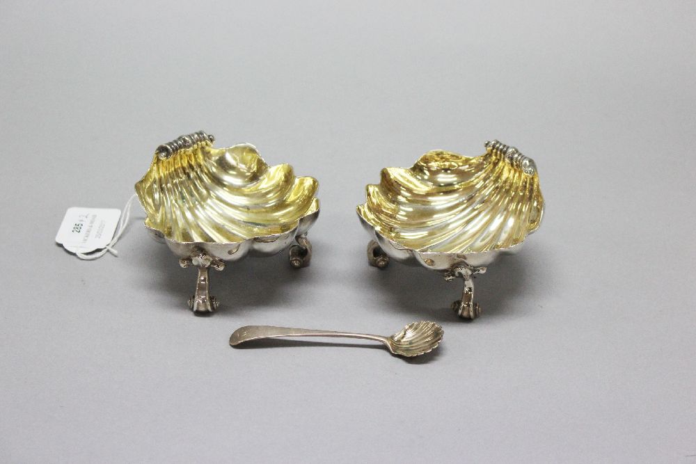 George III scalloped salts, in sterling silver on scrolling feet marked London, 1790, ?G approx