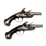 A fine rare pair of antique Paris made flintlock pocket pistols. Half stocked in walnut with steel