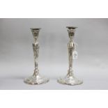 Pair of George III sterling silver candlesticks, by Daniel Smith & Robert Sharp. In the "classical