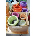 Two boxes of various sized reversible coloured wool covered vases