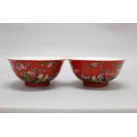 A pair of Chinese red base famille rose bowls, 20th c. Youngzheng mark, each approx 15 cm dia