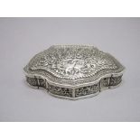 Antique Colonial silver scalloped form hinged box, chased with love birds, foliate decoration and