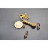 Gold lot to include a 1912 British Sovereign and some other items marked 9ct.