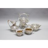 Antique sterling silver melon form five piece tea and coffee service, with half fluting to the body.