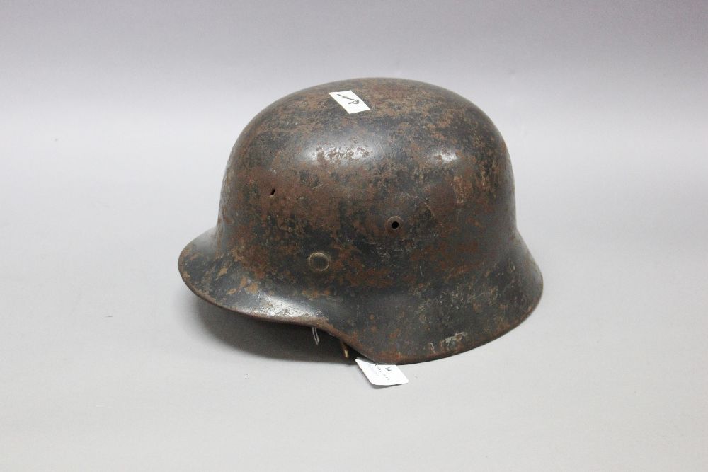 German WWII / WW2 era steel helmet, liner and chinstrap present, approx 30cm L