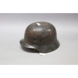 German WWII / WW2 era steel helmet, liner and chinstrap present, approx 30cm L