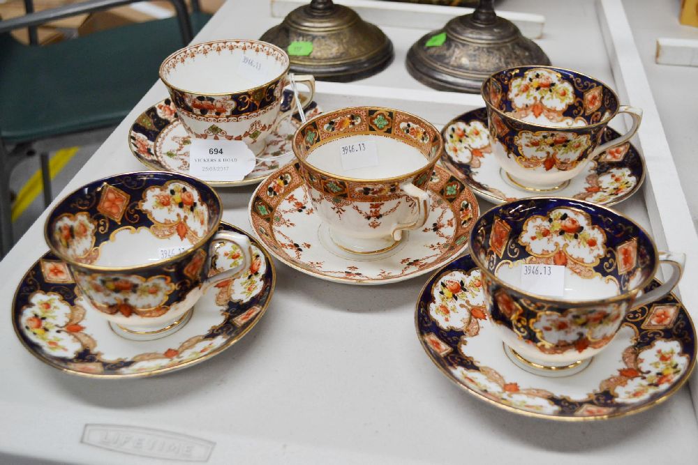 Five assorted sets of cups and saucers to include Royal Albert