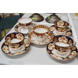 Five assorted sets of cups and saucers to include Royal Albert