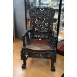 Impressive antique Chinese carved hardwood dragon arm chair