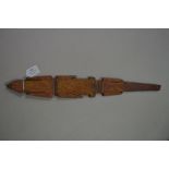 Aboriginal painted hardwood dance wand, decorated in natural earth pigments, in the form of a