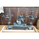 Antique French bronze figural mantle clock and garnitures, has key & pendulum (in office), approx