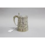 Georgian tankard, in sterling silver with a hinged lid, tapering cylindrical form and later chasing,