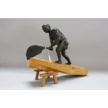 Fine antique Japanese Meiji period bronze figure of a wood chopper on a simulated box wood stand,