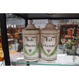 Two antique 18th century tin glazed terracotta chemist jars, each approx 26cm H (2)