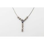 Ladies drop 18ct white gold pendant set with diamonds & sapphire, on a 9ct gold chain approx 10