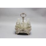 Georgian cruet set on a sterling silver stand. By William Bateman. With gadroon & shell borders,