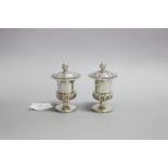 Chinese Export silver pedestal salt & pepper shakers. Circa 1830-1850 With. Urn Form with gadroon