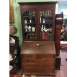 Georgian mahogany bureau book case with astro glazed doors and fitted interior in the Chippendale