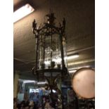 Large brass lantern with etched glass panels.