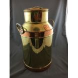 Copper and brass milk can.