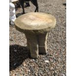 Sandstone circular garden table. (67 cm H x 58 cm H).