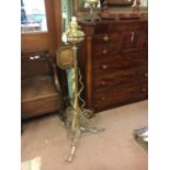 Victorian brass and metal standard lamp.