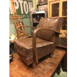 1930's leather and wood armchair.