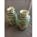 Pair of hand painted Oriental vases.