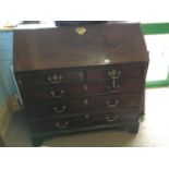 Georgian mahogany fall front bureau with two short drawers over three long graduated drawers.