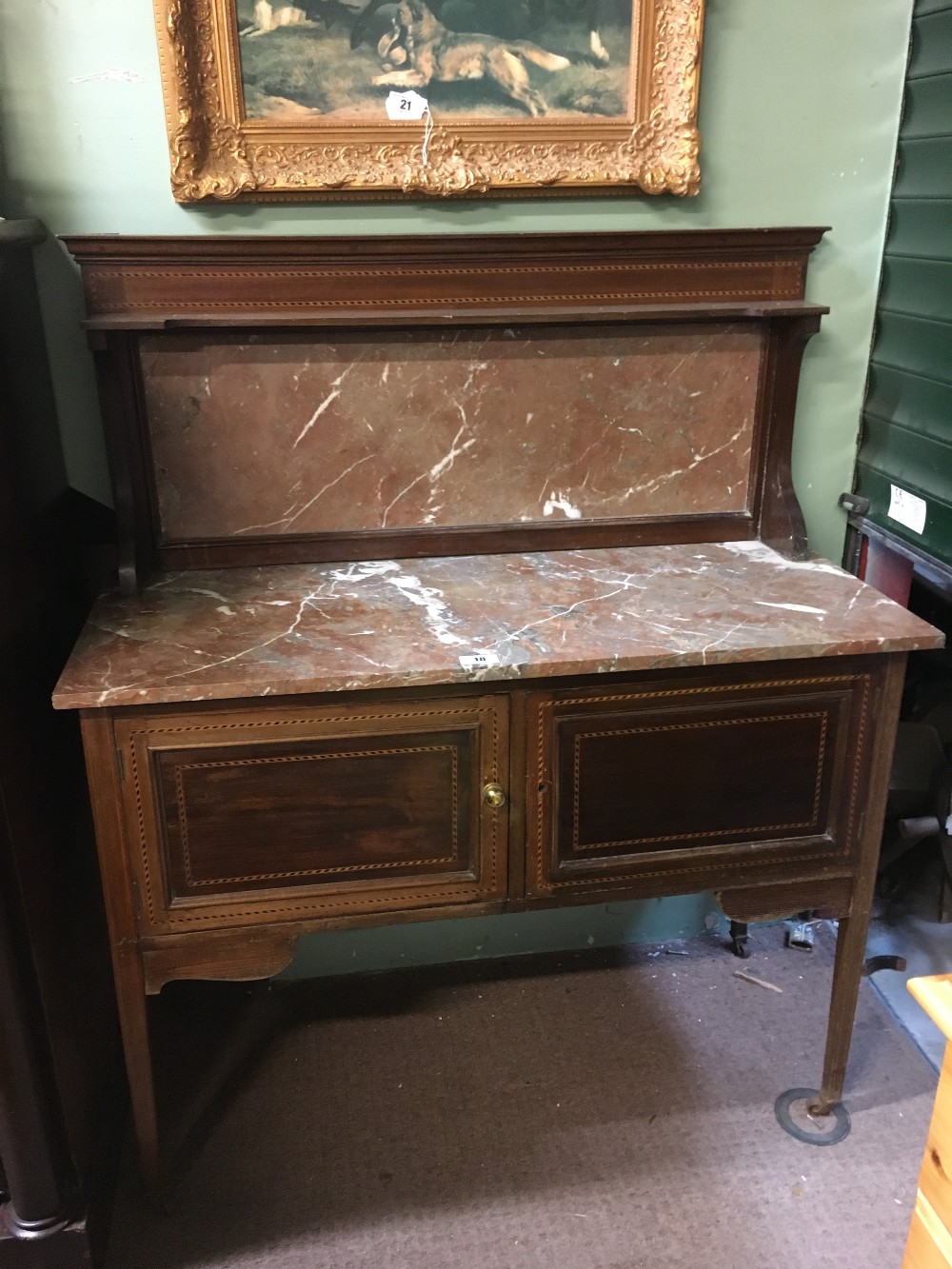 Edwardian inlaid mahogany wash stand with marble top.