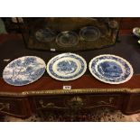 Three blue and white Staffordshire plate depicting country scenes.