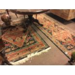 Two decorative carpet runners.