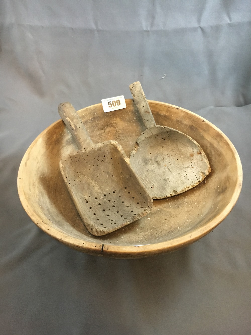 19th. C. butter bowl with two butter scoops.