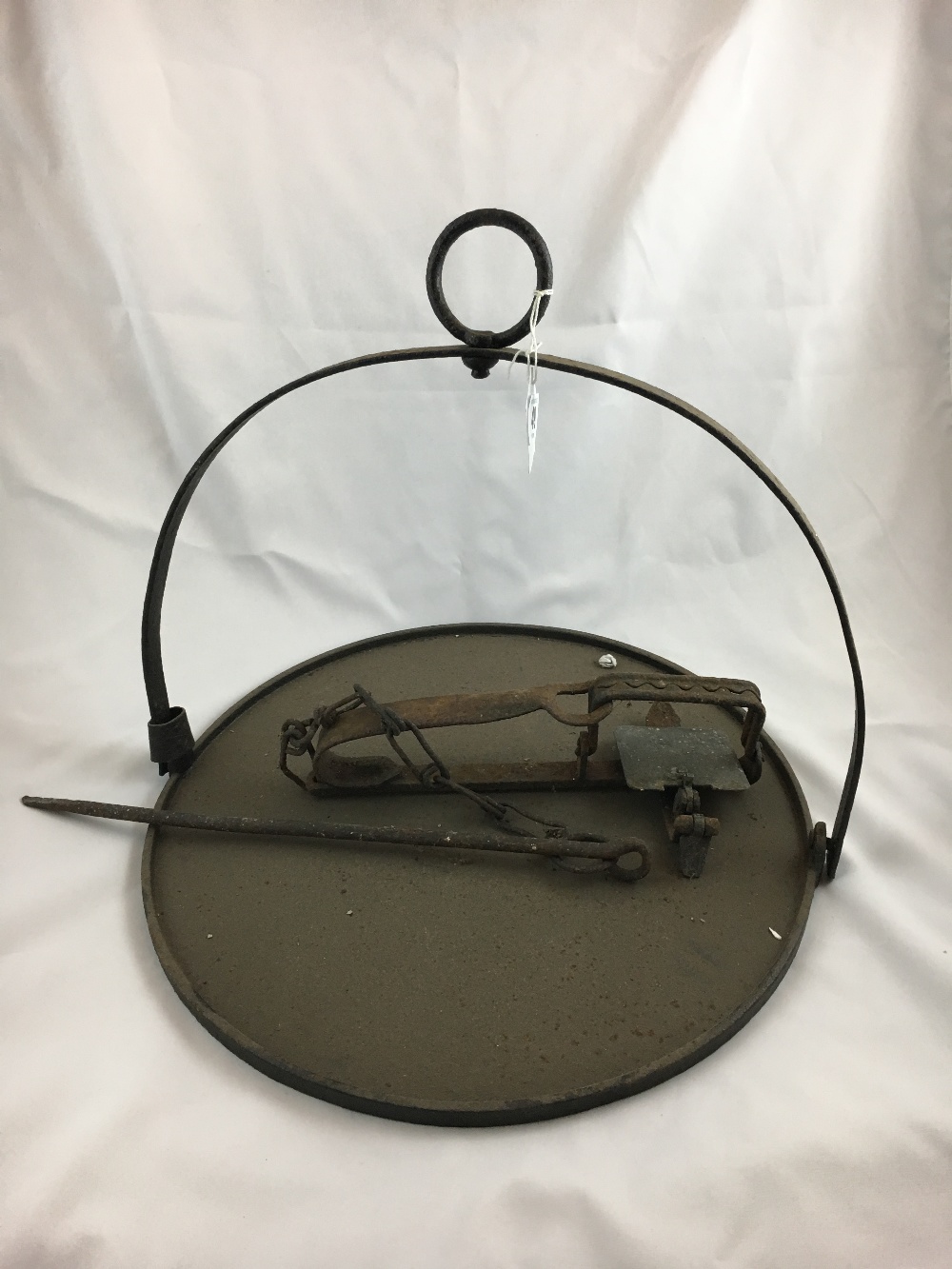 C. 19th. griddle pan and rat trap.