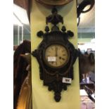 19th. C . Cast iron wall clock.