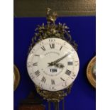 Early 19th C. French bracket clock with ceramic dial and brass mounts.