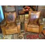 Pair of 1940s Art Deco leather club chairs.