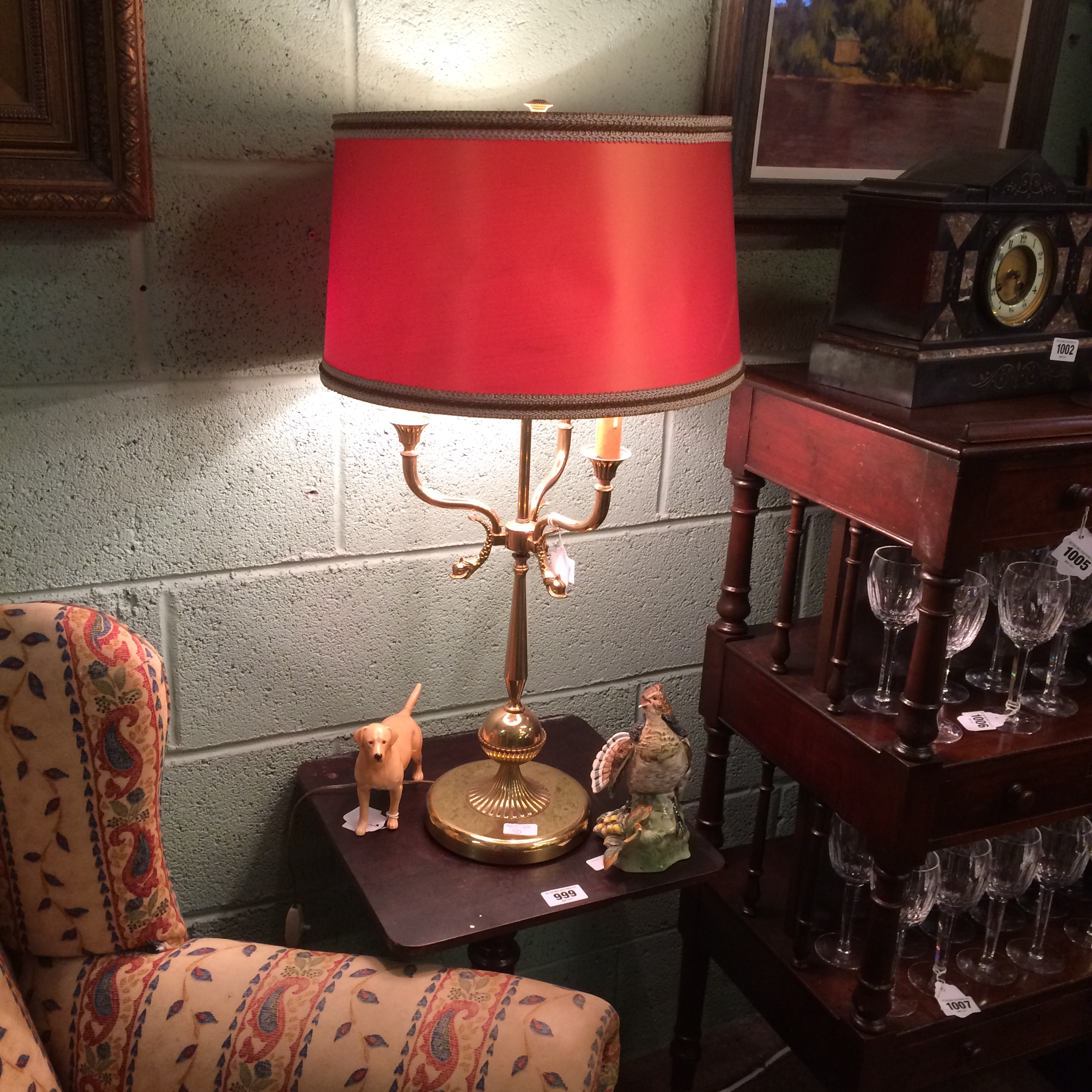 Decorative brass table lamp with original shade.
