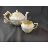 Third period BELLEEK teapot and jug with green stamp.
