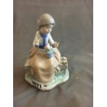 Early Lladro figure of a girl at rest.